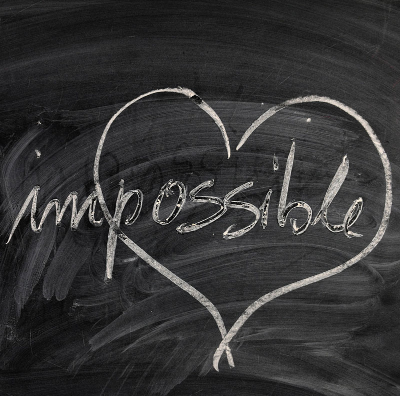 Words Impossible Spelled on Chalkboard